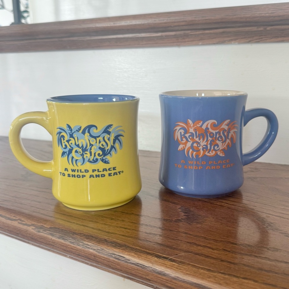 Vintage New (2) 1999 RAINFOREST CAFE Blue and Yellow Ceramic Mugs